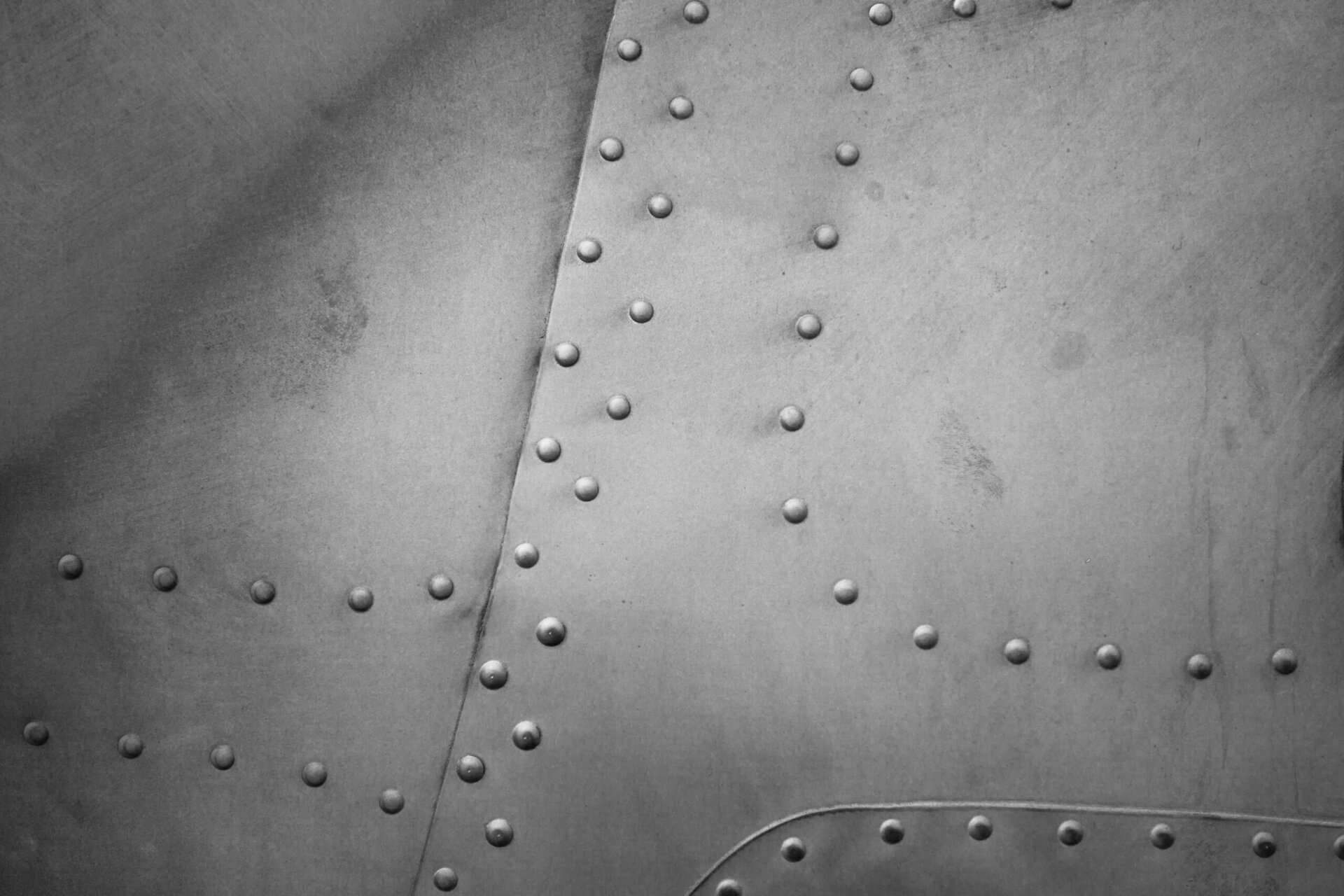 Riveted metal surface